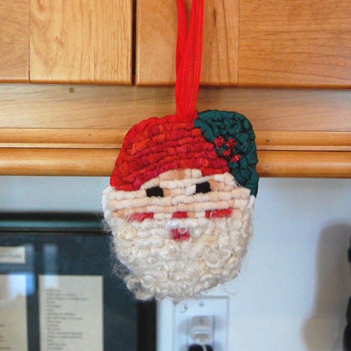 Locker hook ornaments with wool, fabric & mohair locks.